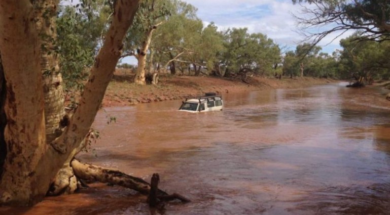 Man walks 25 miles to get help after pregnant woman becomes trapped in floodwaters